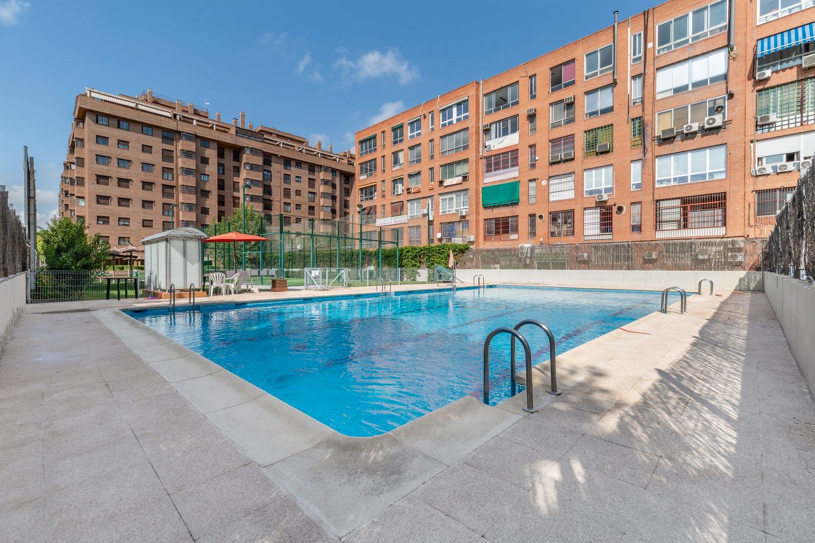 Swimming pool of Flat for sale in  Madrid Capital  with Parquet flooring and Storage room