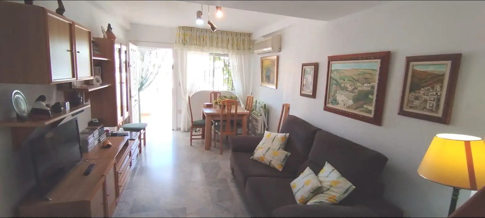 Sala de estar de Casa adosada en venta en Motril con Aire acondicionado, Terraza y Trastero