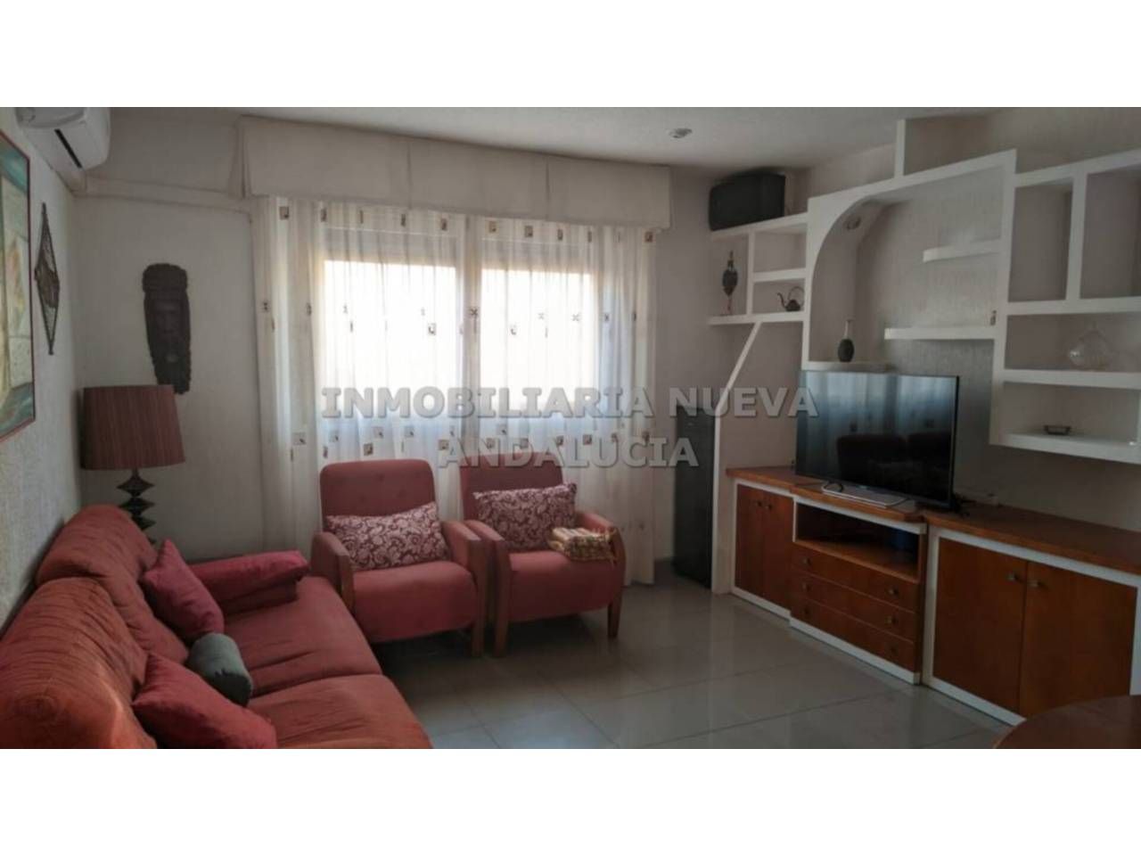 Sala d'estar de Apartament de lloguer en  Almería Capital amb Aire condicionat, Terrassa i Moblat