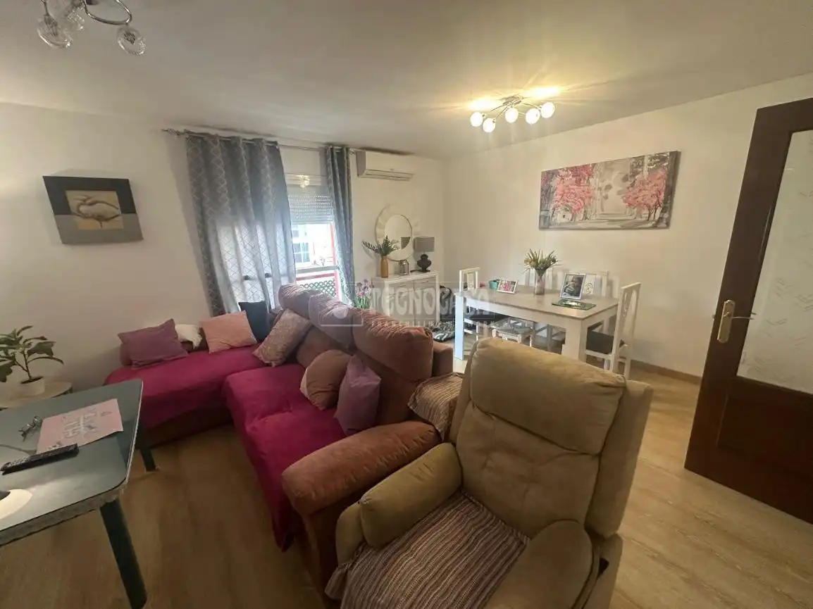 Sala de estar de Casa adosada en venta en Málaga con Aire acondicionado, Terraza y Trastero