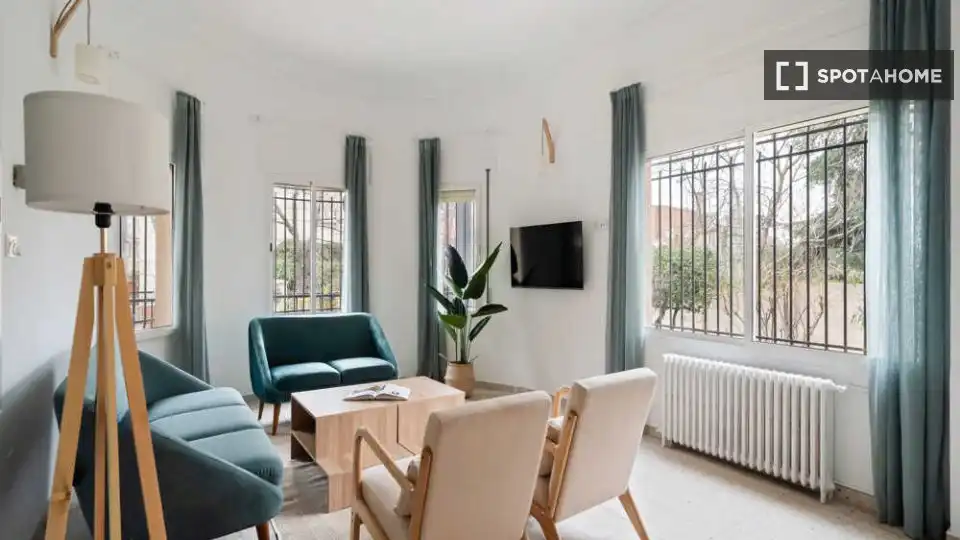Sala de estar de Piso para compartir en Madrid con Aire acondicionado, Terraza y Amueblado