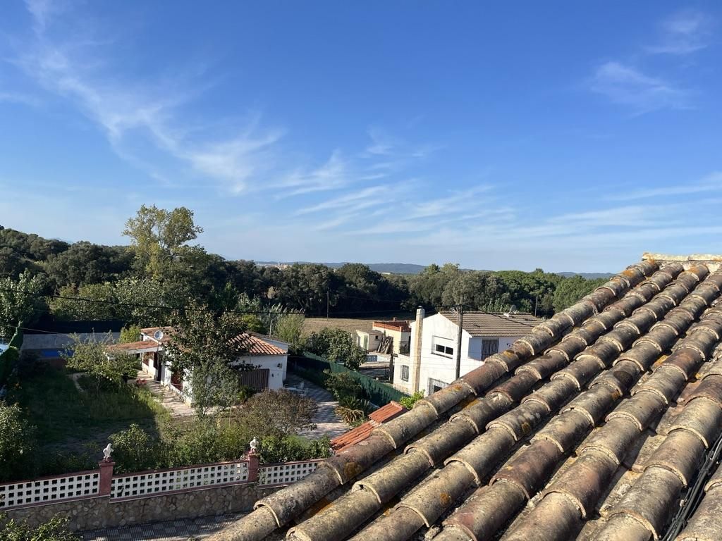 Exterior view of Single-family semi-detached for sale in Llagostera  with Terrace, Storage room and Swimming Pool