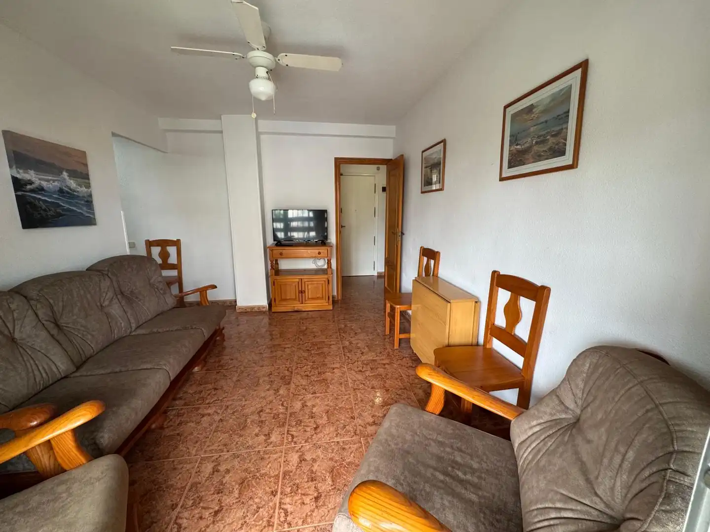 Sala d'estar de Apartament de lloguer en El Campello amb Jardí privat, Terrassa i Moblat