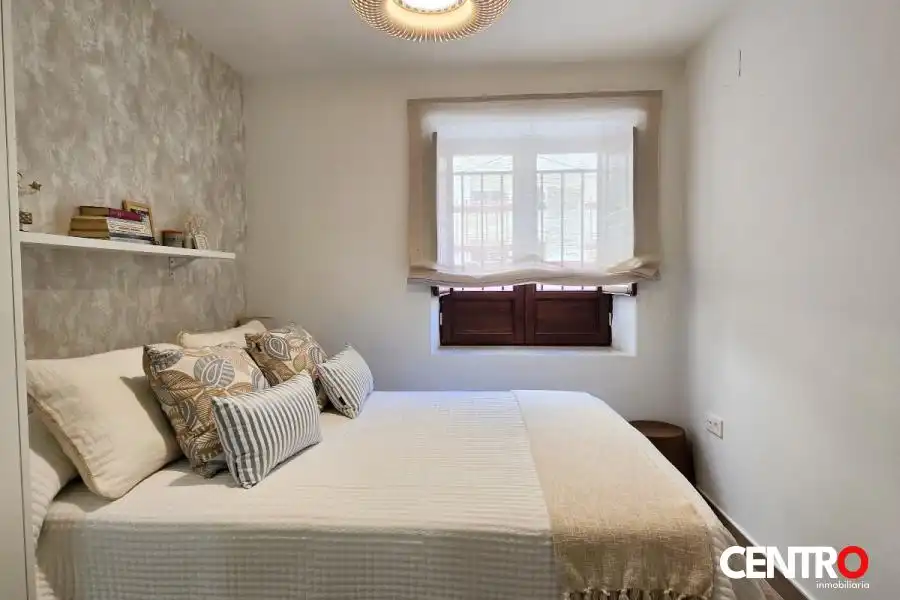 Dormitori de Apartament de lloguer en Granada amb Aire condicionat