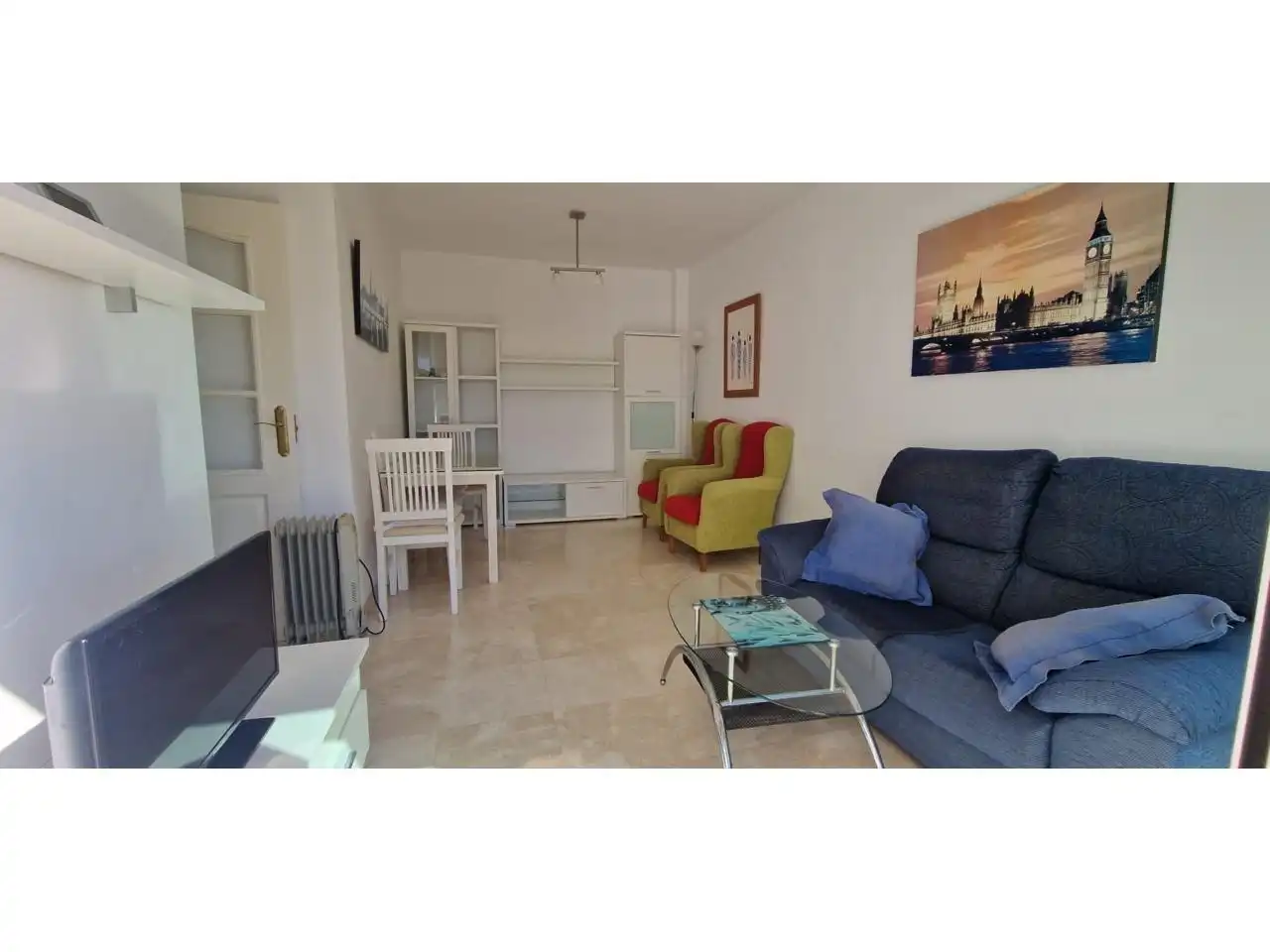 Sala d'estar de Apartament en venda en Benalmádena amb Aire condicionat, Jardí privat i Terrassa
