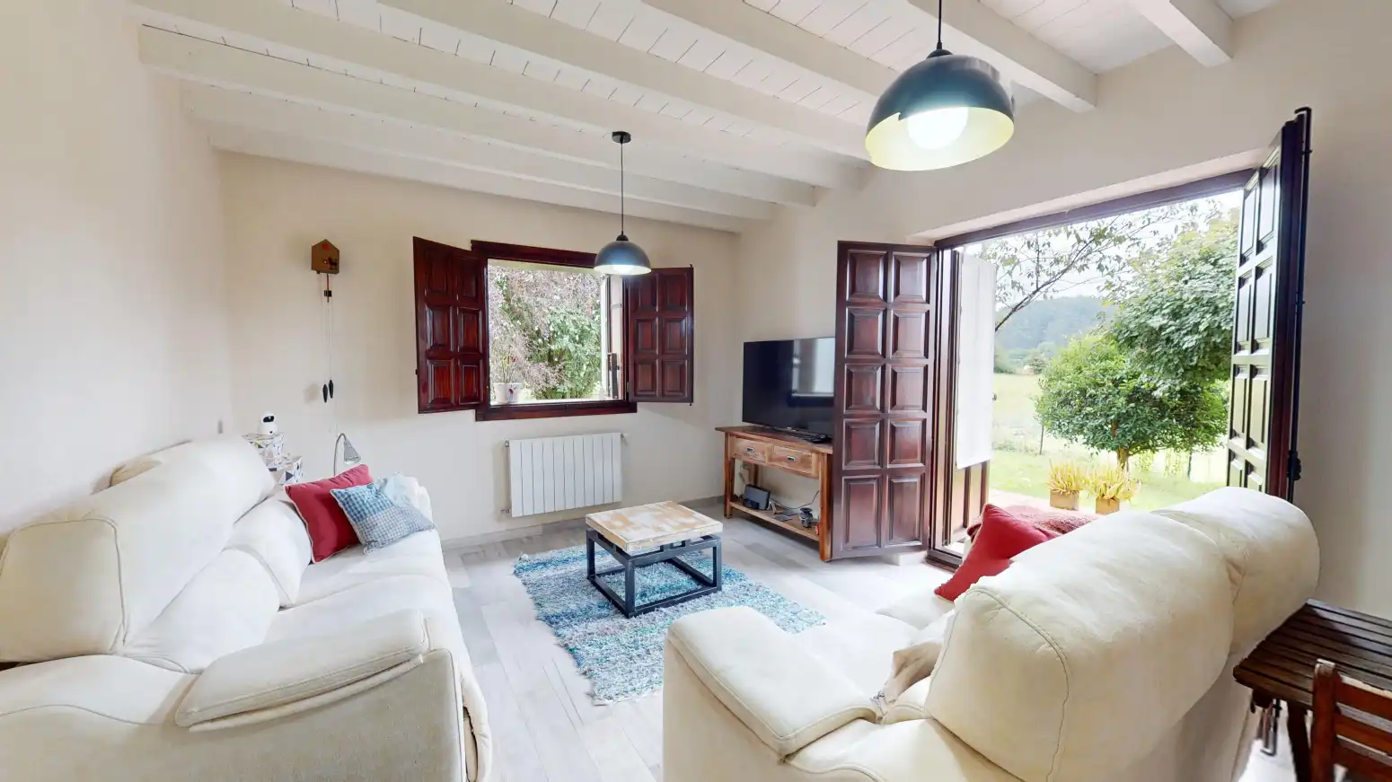 Sala d'estar de Casa adosada en venda en Piélagos amb Jardí privat i Parquet