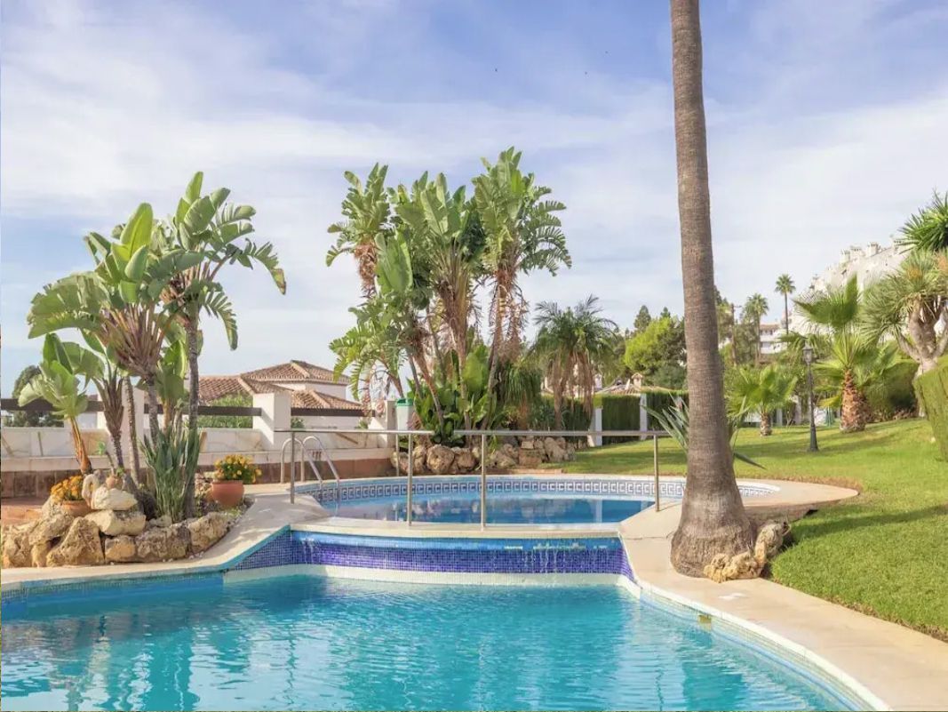 Swimming pool of Flat for sale in Mijas  with Heating, Parquet flooring and Community pool