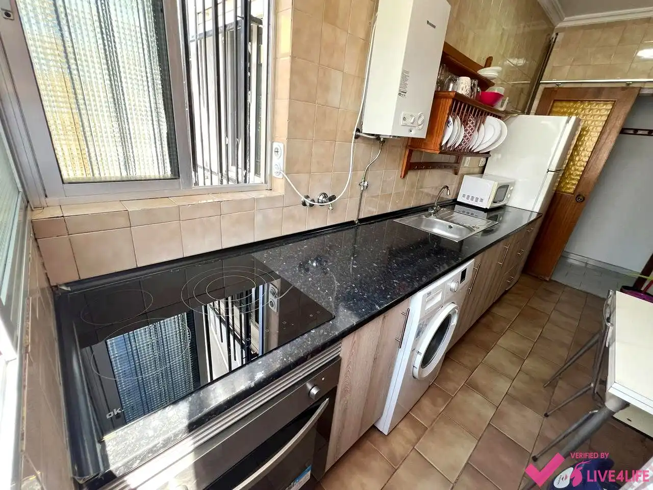 Kitchen of Flat for share in Sevilla  with Air Conditioner, Heating and Furnished