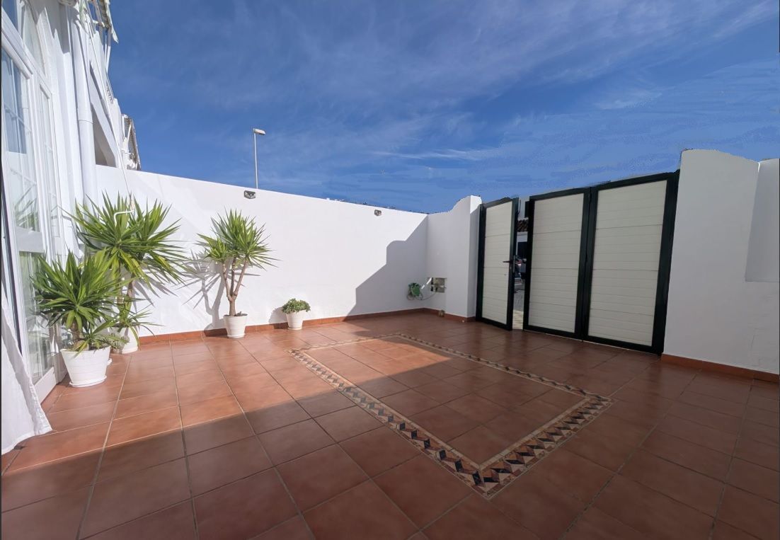 Terrassa de Casa adosada en venda en El Portil amb Aire condicionat i Piscina comunitària