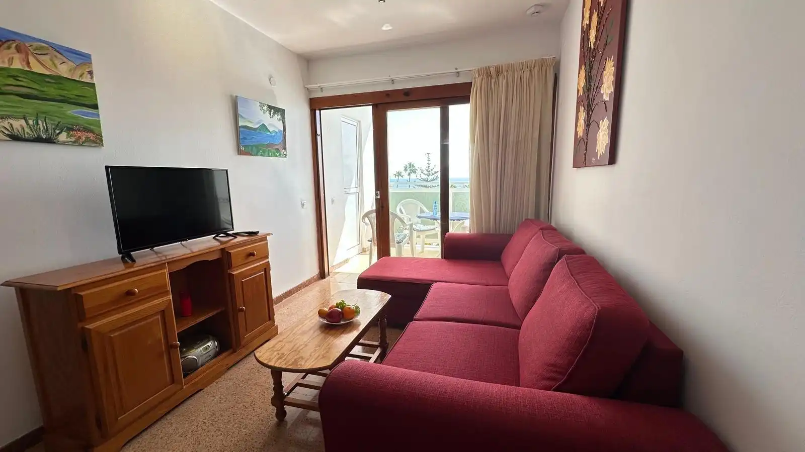 Sala de estar de Apartamento en venta en San Bartolomé de Tirajana con Amueblado, Balcón y Piscina comunitaria