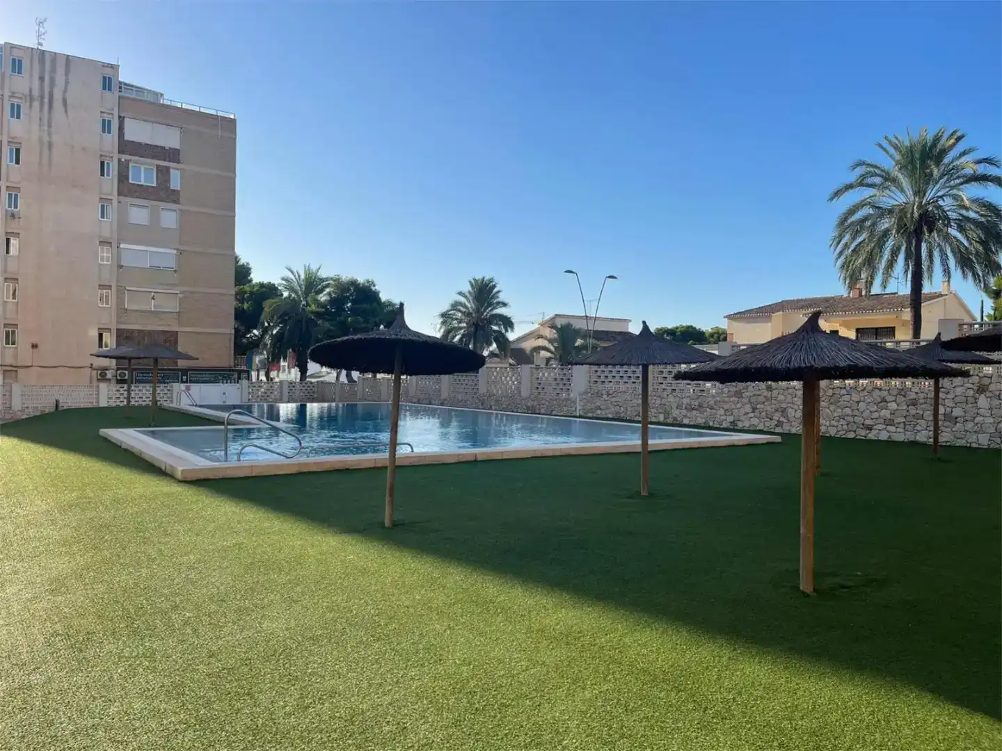 Swimming pool of Flat for sale in Orihuela  with Air Conditioner, Parquet flooring and Storage room