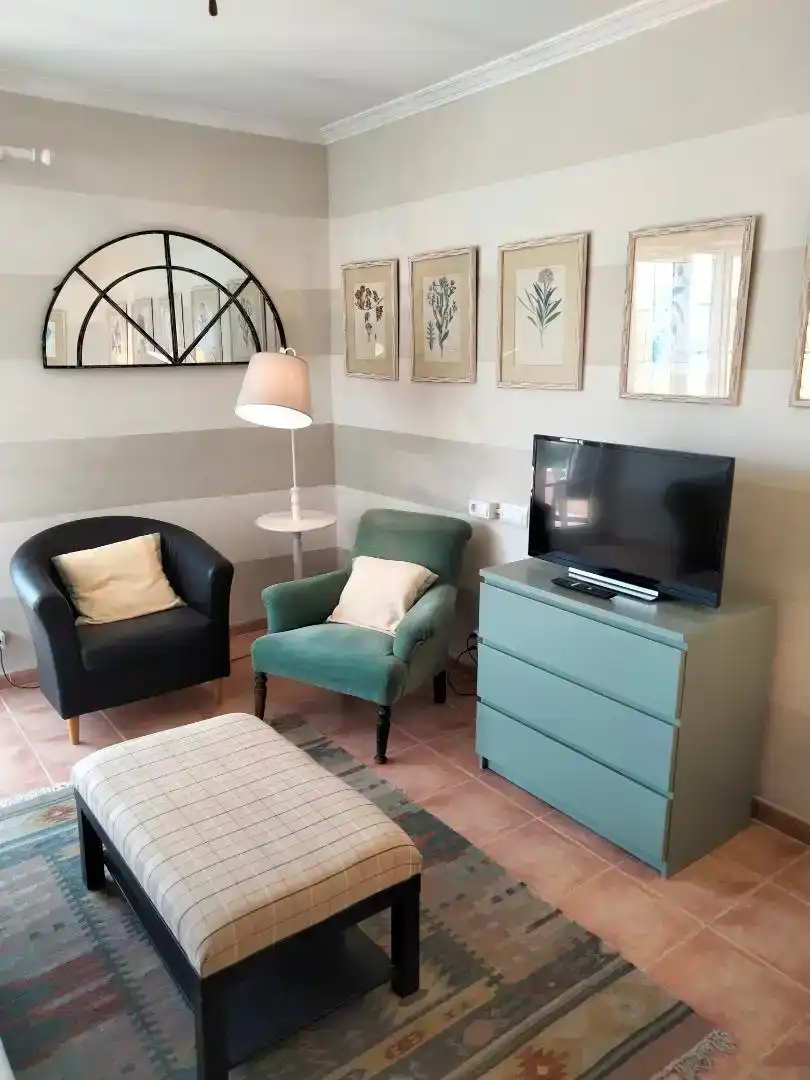 Living room of Flat for rent in Pollença  with Air Conditioner, Private garden and Furnished