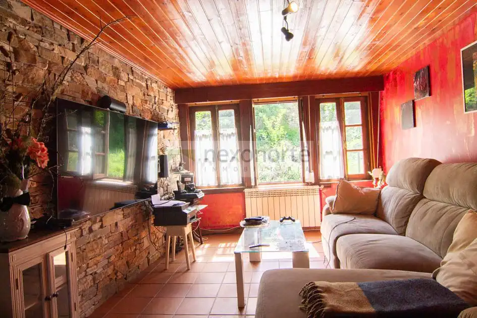 Living room of Country homes for sale in Muras  with Heating and Storage room