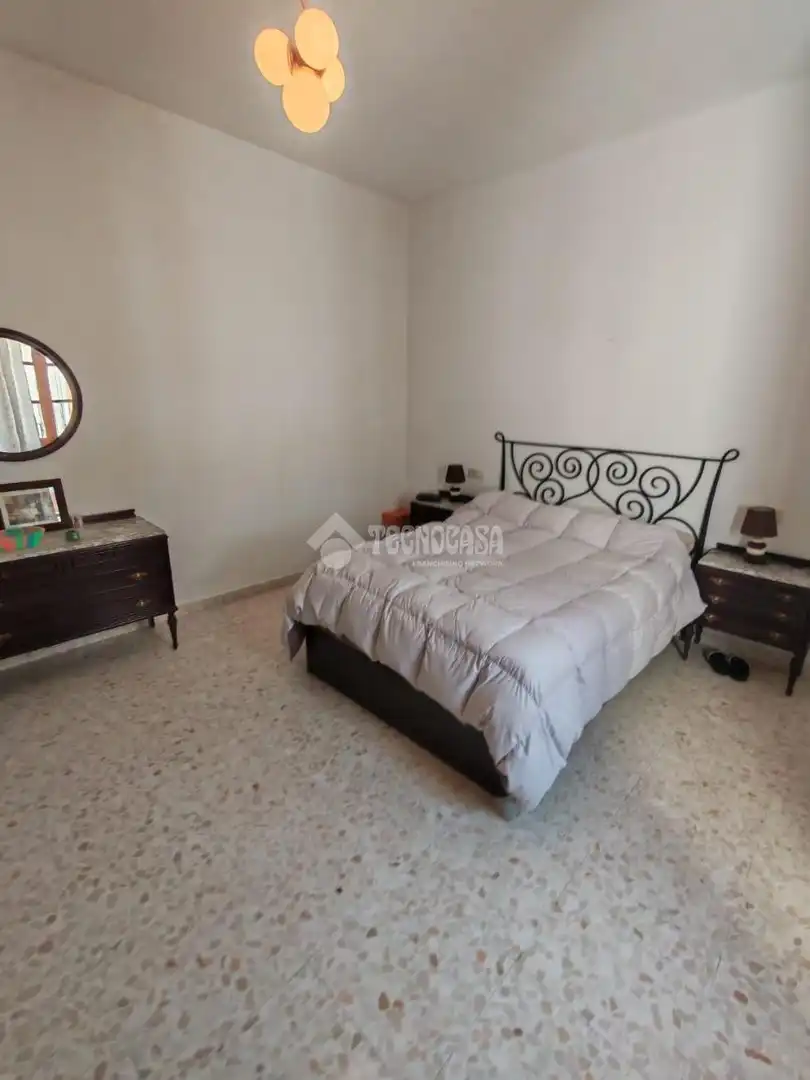 Dormitori de Casa adosada en venda en Marchena amb Aire condicionat