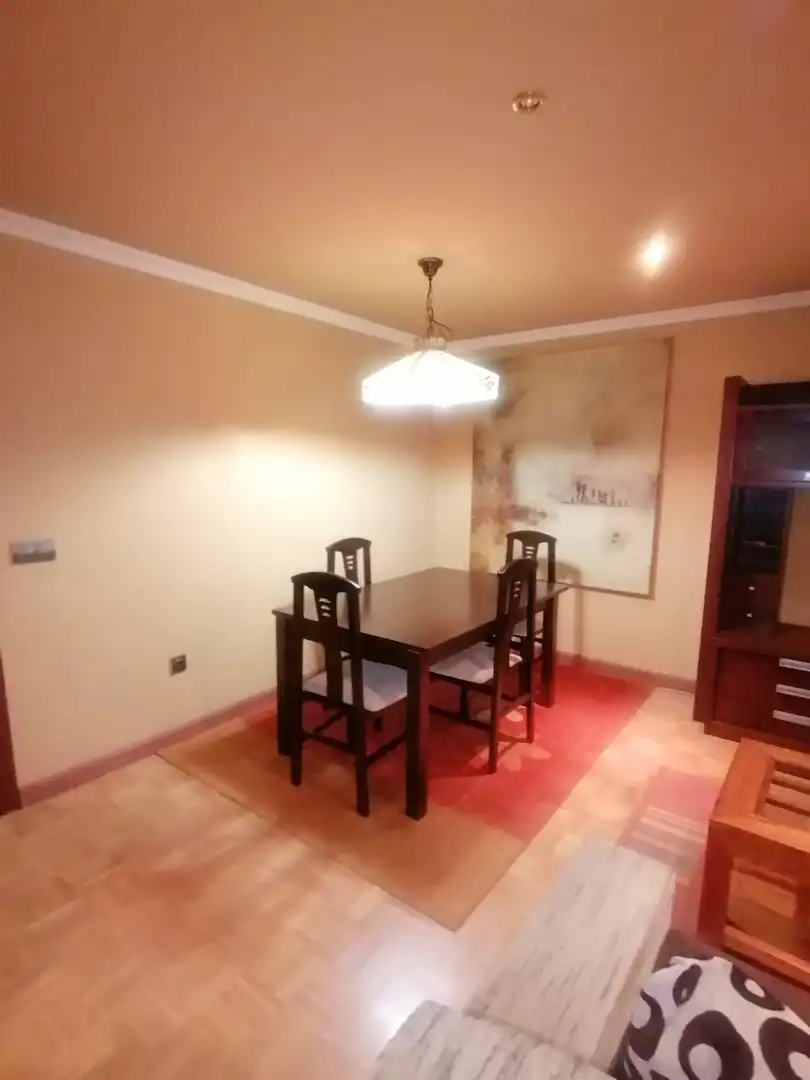 Menjador de Dúplex en venda en Gijón  amb Calefacció, Parquet i Traster