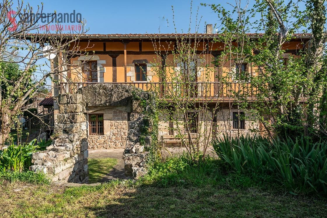 Vista exterior de Casa o xalet en venda en Molledo amb Calefacció, Jardí privat i Terrassa
