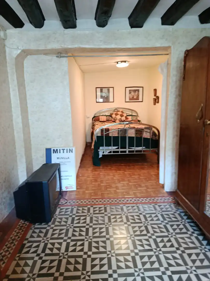 Habitación de Casa adosada en venta en Munilla con Trastero, Amueblado y Balcón