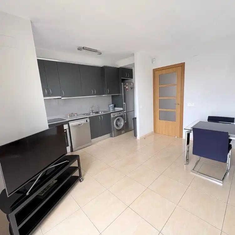 Cuina de Apartament en venda en Mont-roig del Camp amb Aire condicionat, Moblat i Piscina comunitària