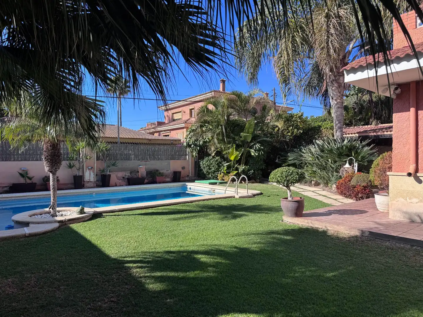 Garden of Houses for sale in Roquetas de Mar  with Air Conditioner, Storage room and Swimming Pool