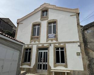 Vista exterior de Casa adosada en venda en Carnota amb Balcó