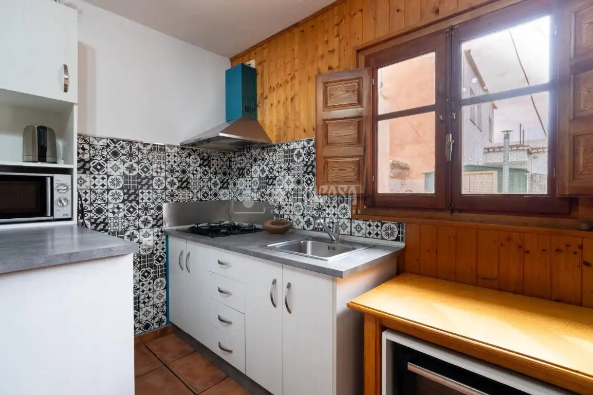 Cuina de Casa adosada en venda en Órgiva amb Aire condicionat, Terrassa i Moblat