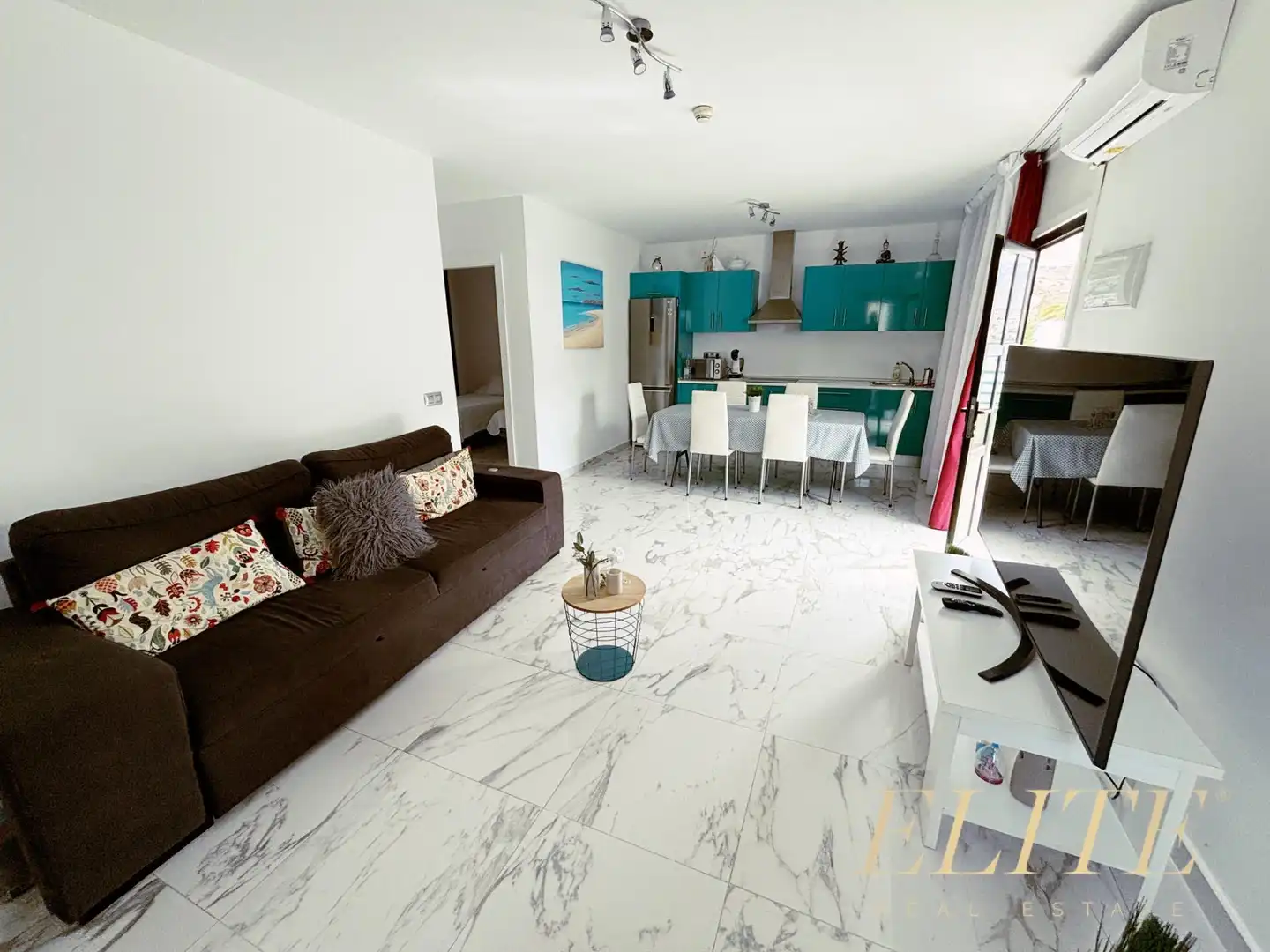 Sala d'estar de Apartament en venda en Mogán amb Aire condicionat, Jardí privat i Terrassa