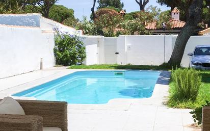 Piscina de Casa adosada en venda en Chiclana de la Frontera amb Aire condicionat, Calefacció i Jardí privat