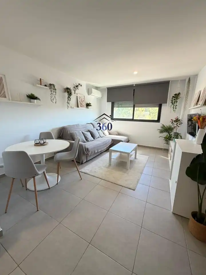 Sala de estar de Piso en venta en Cáceres con Aire acondicionado, Terraza y Amueblado