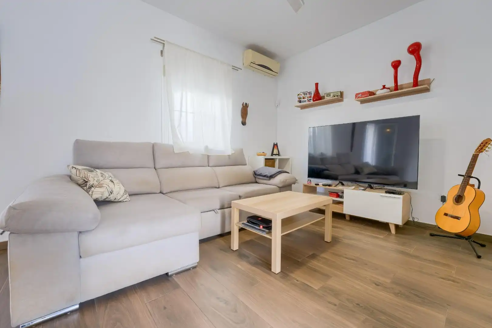 Sala de estar de Casa adosada en venta en Umbrete con Aire acondicionado, Terraza y Trastero