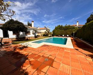 Exterior view of House or chalet for sale in Málaga Capital  with Air Conditioner, Terrace and Swimming Pool