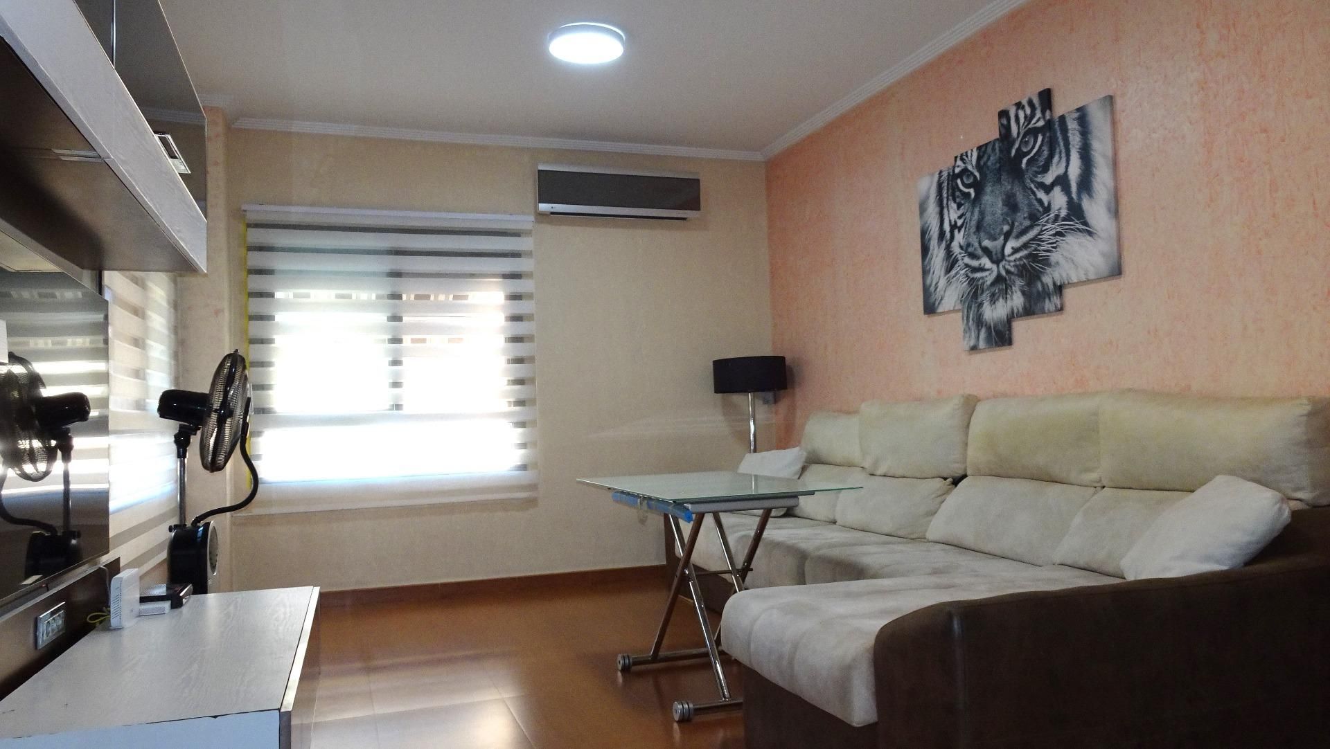 Sala de estar de Piso de alquiler en  Sevilla Capital con Aire acondicionado