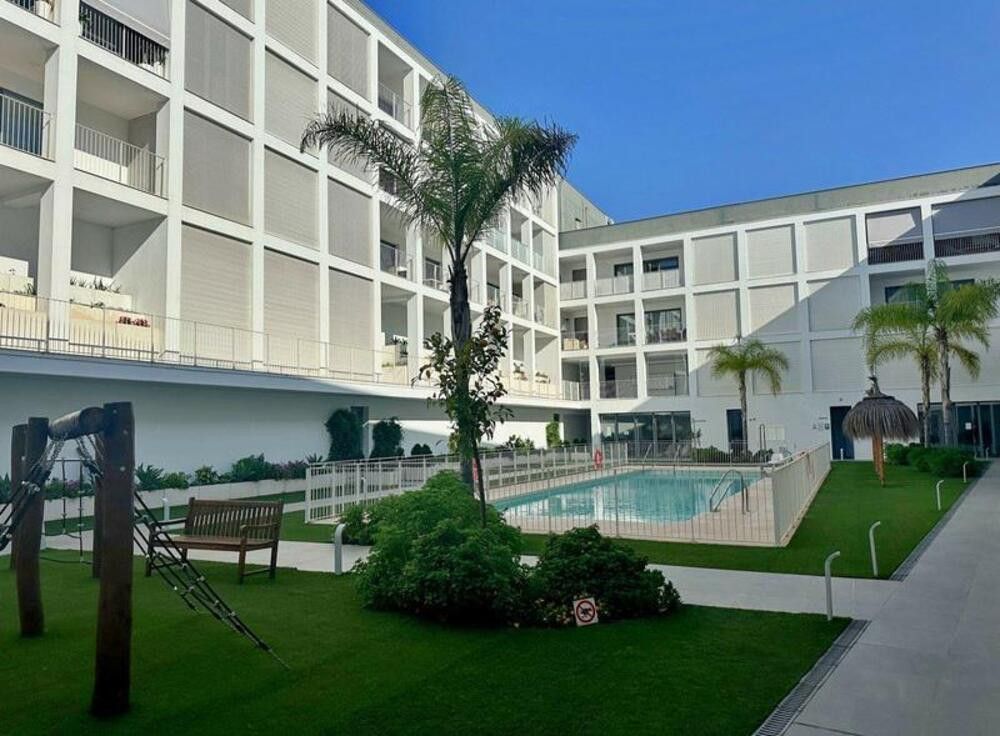Swimming pool of Apartment for sale in Marbella  with Air Conditioner, Terrace and Storage room