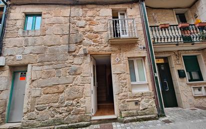 Vista exterior de Casa adosada en venda en Rianxo amb Terrassa