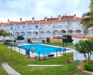 Piscina de Casa adosada en venda en Benalmádena amb Aire condicionat, Calefacció i Jardí privat