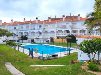 Swimming pool of Single-family semi-detached for sale in Benalmádena  with Air Conditioner, Heating and Private garden