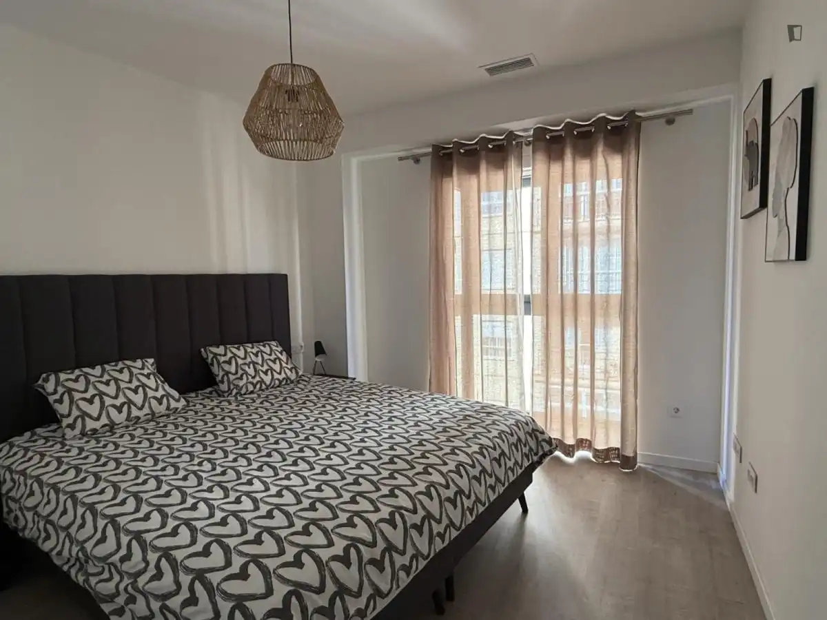 Dormitori de Apartament de lloguer en Málaga amb Aire condicionat, Calefacció i Moblat