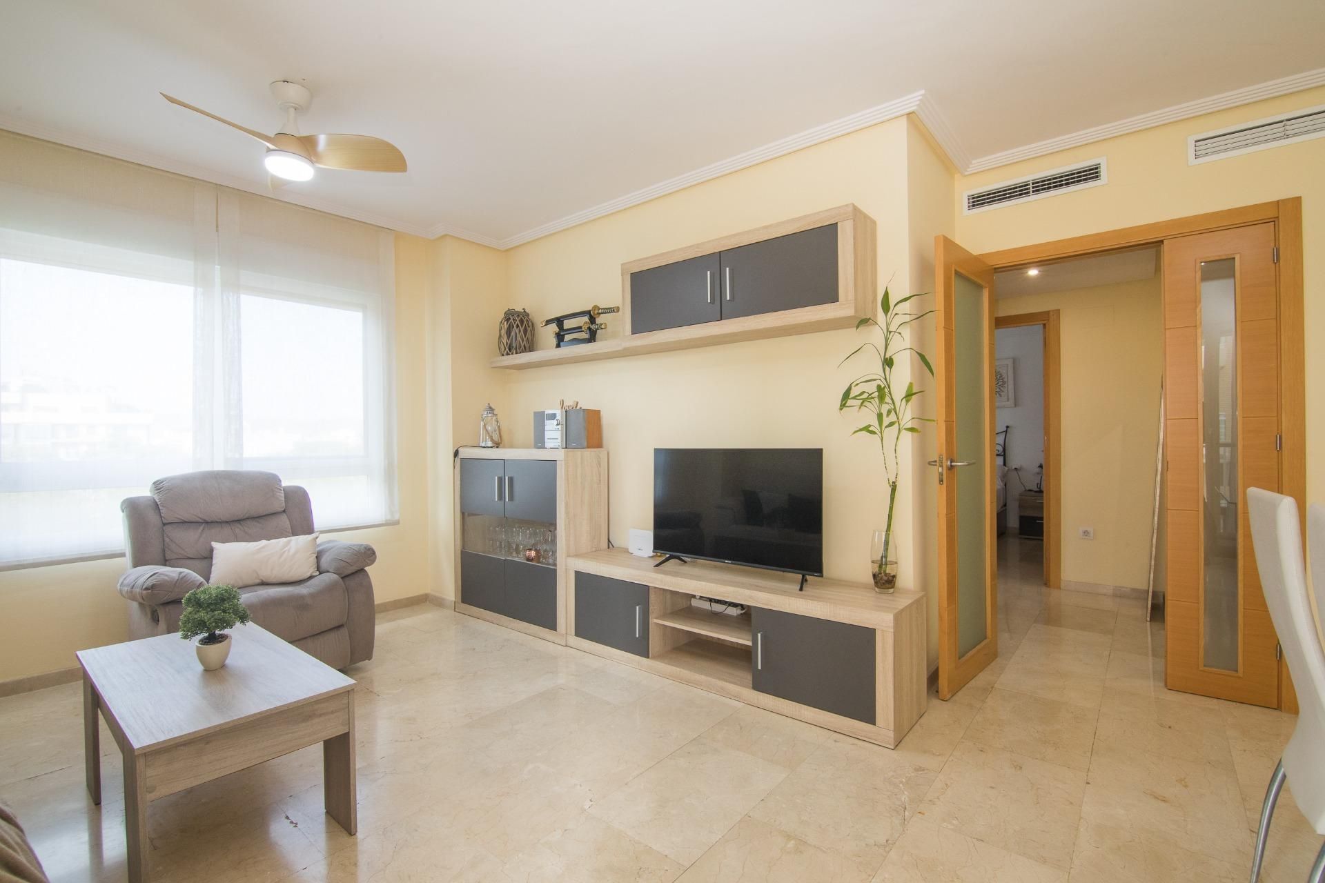 Sala de estar de Piso en venta en El Campello con Aire acondicionado, Terraza y Piscina comunitaria