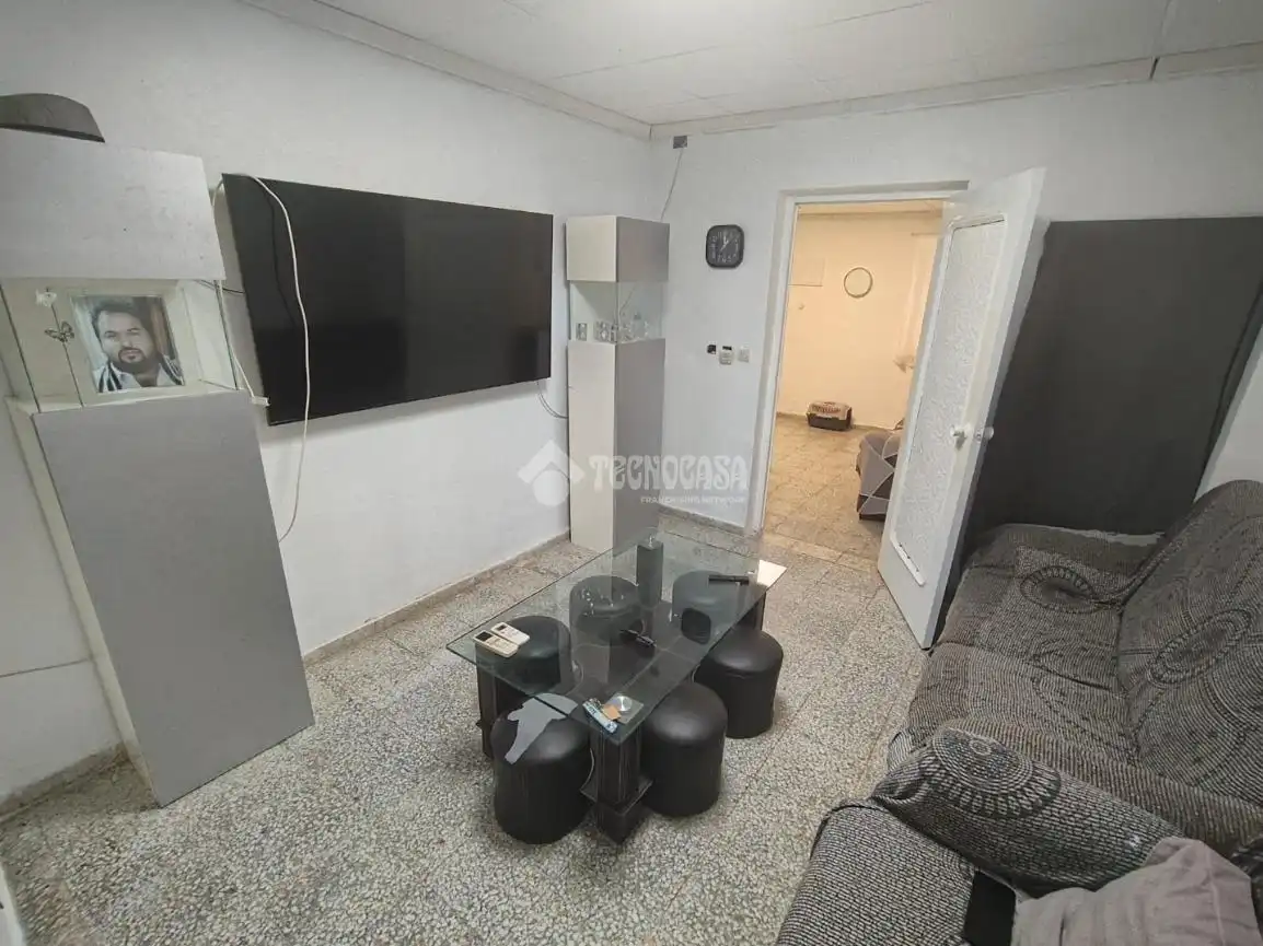 Sala d'estar de Casa adosada en venda en Espeluy amb Aire condicionat i Terrassa