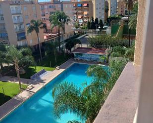 Piscina de Pis de lloguer en La Pobla de Farnals amb Aire condicionat, Piscina i Balcó