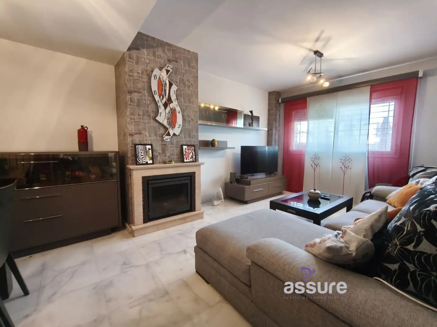 Sala de estar de Casa adosada en venta en Huelva con Aire acondicionado, Calefacción y Jardín privado