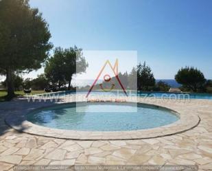 Piscina de Casa adosada de lloguer en Sant Josep de sa Talaia amb Aire condicionat, Terrassa i Moblat