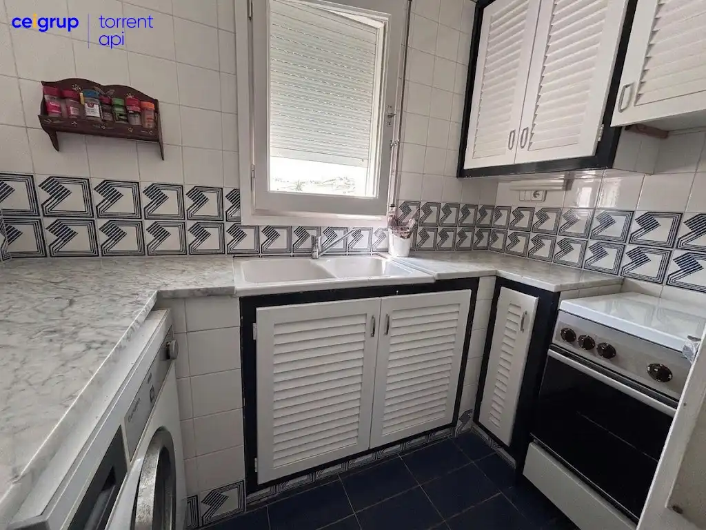 Kitchen of Flat for sale in L'Escala  with Terrace, Swimming Pool and Furnished