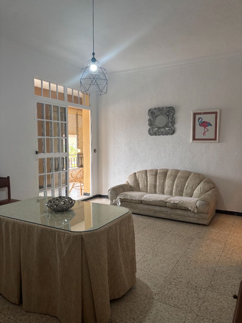 Sala d'estar de Pis de lloguer en La Puebla del Río amb Aire condicionat, Terrassa i Traster