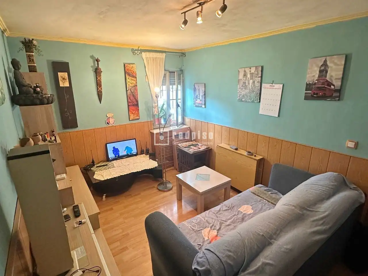Sala d'estar de Pis en venda en  Madrid Capital amb Calefacció i Moblat