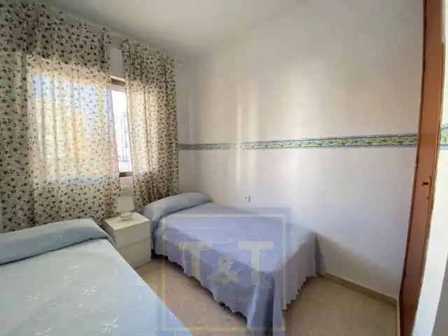 Dormitori de Apartament de lloguer en La Antilla amb Terrassa i Moblat