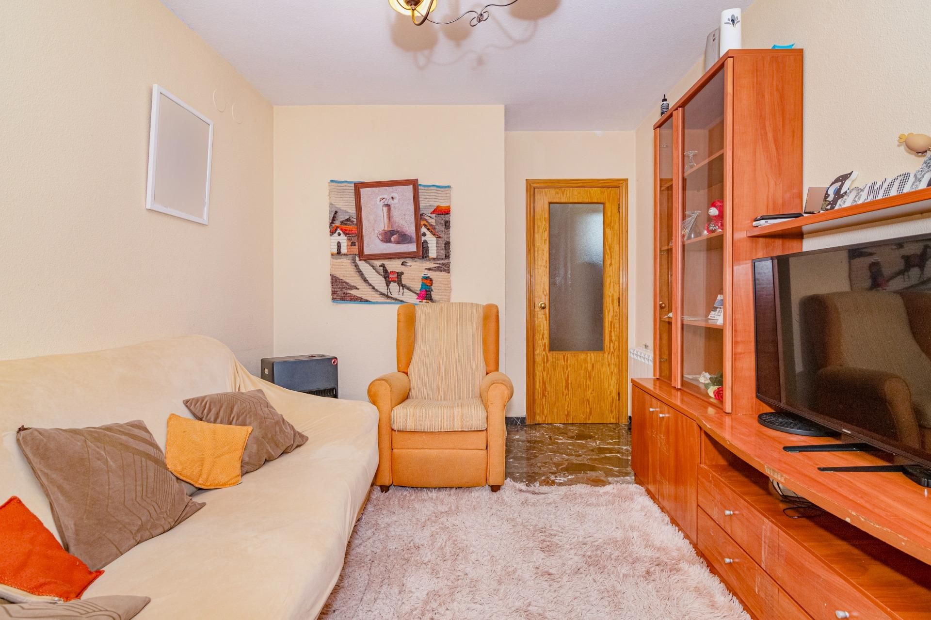 Living room of Planta baja for sale in Cenes de la Vega  with Air Conditioner and Balcony