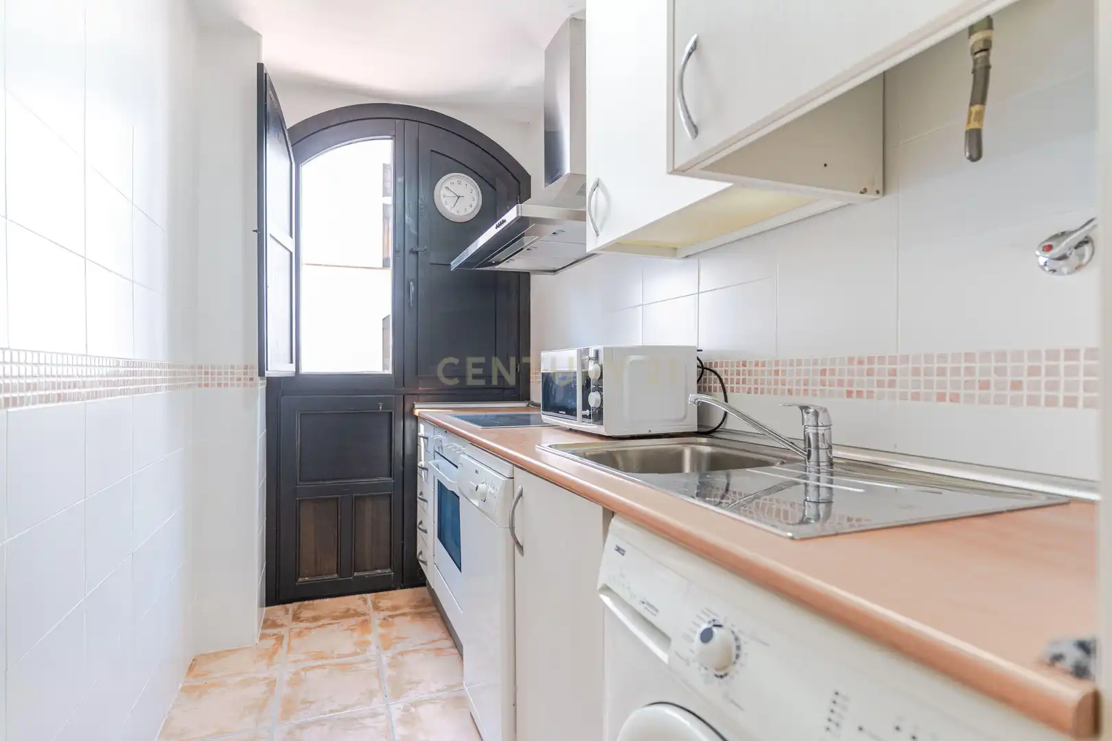 Cuina de Apartament en venda en Vélez de Benaudalla amb Aire condicionat i Piscina comunitària