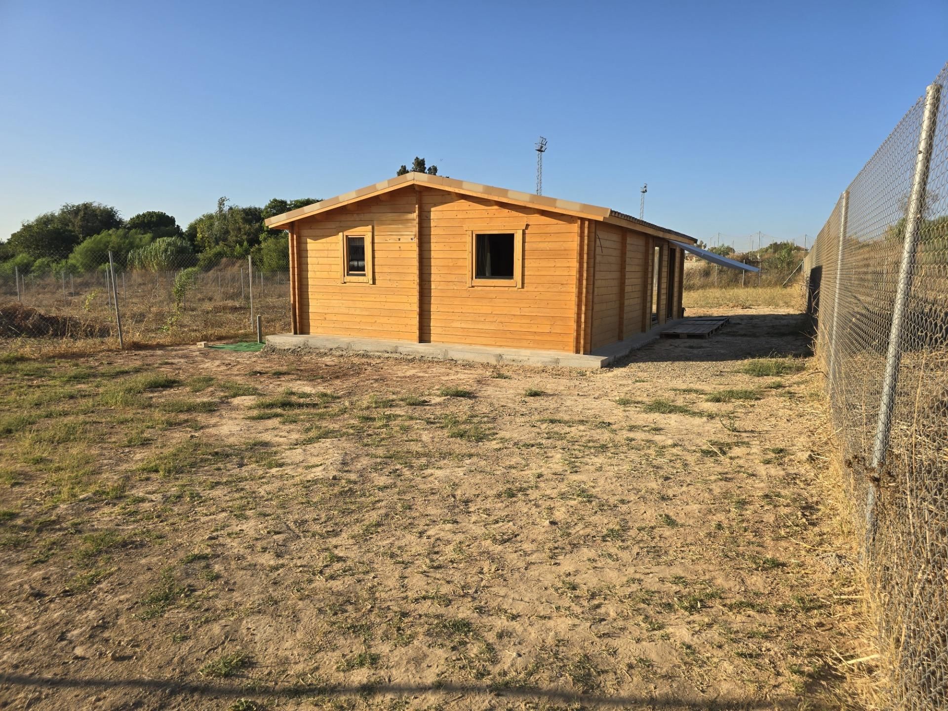 Exterior view of House or chalet for sale in Palomares del Río  with Private garden