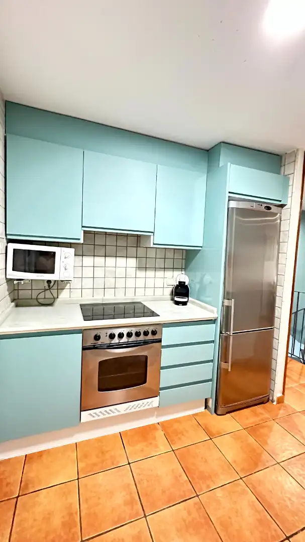 Cuina de Apartament de lloguer en Oliva amb Aire condicionat, Calefacció i Terrassa