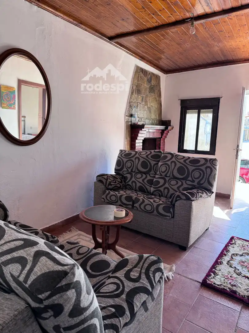 Sala de estar de Casa adosada en venta en Villardondiego con Terraza, Trastero y Amueblado